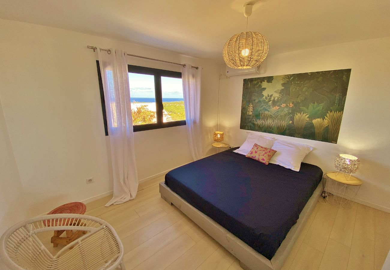 Chambre vue mer — fresque jungle